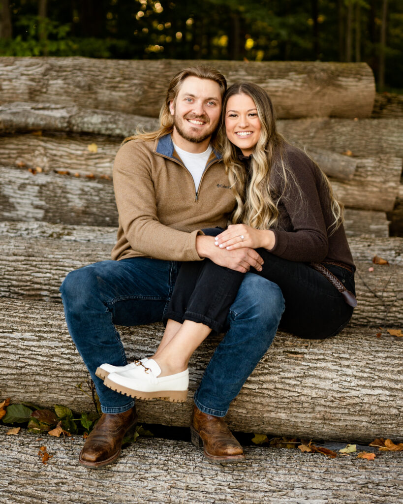 Kristen and Levi's fall engagement session in an apple orchard. The couple wore the perfect neutral outfits that complemented each other perfectly. 