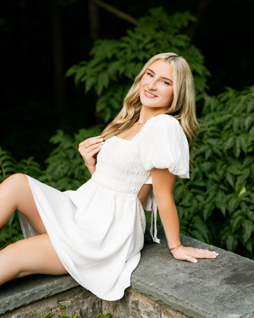 This photo shows a glimpse of Adrienne's Rochester senior portraits that were taken at the Sunken gardens.