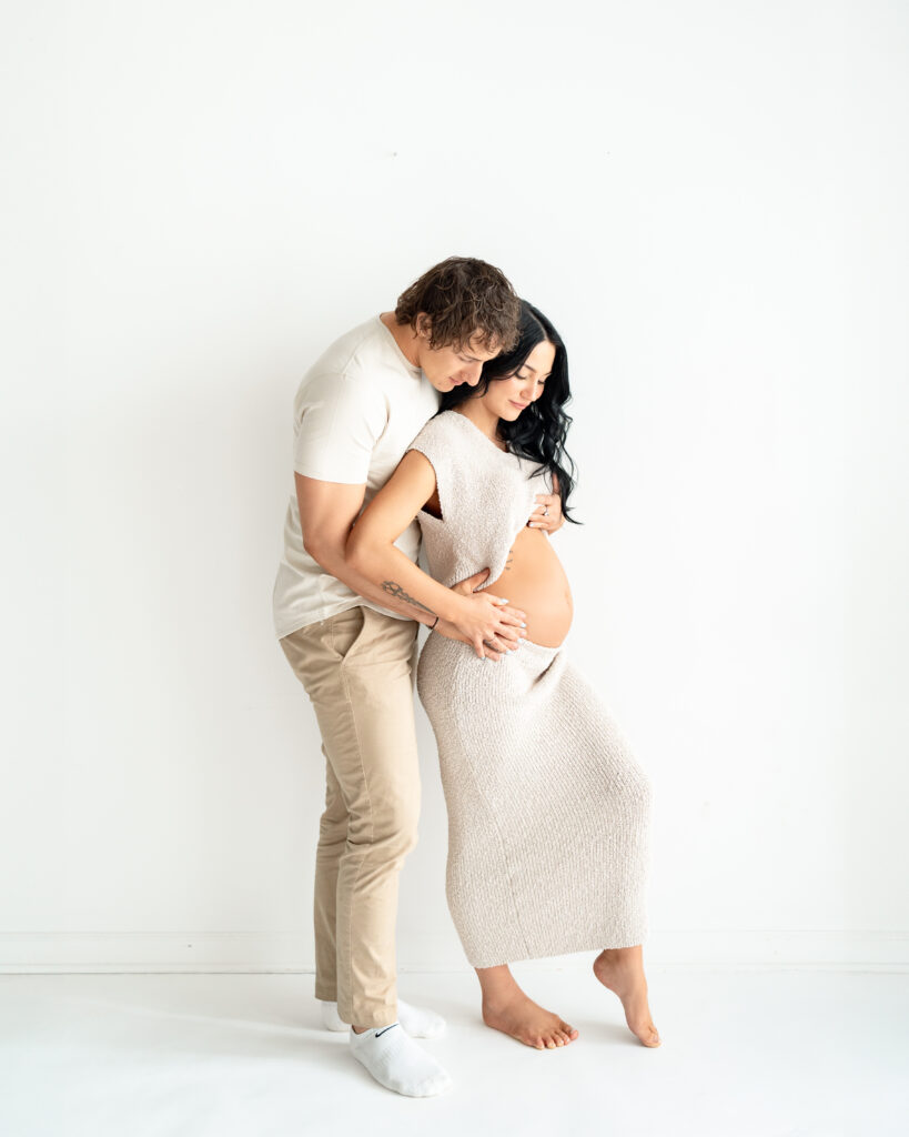 This baby announcement at Gallery 48 features mom and dad to be, Savannah and Jake.